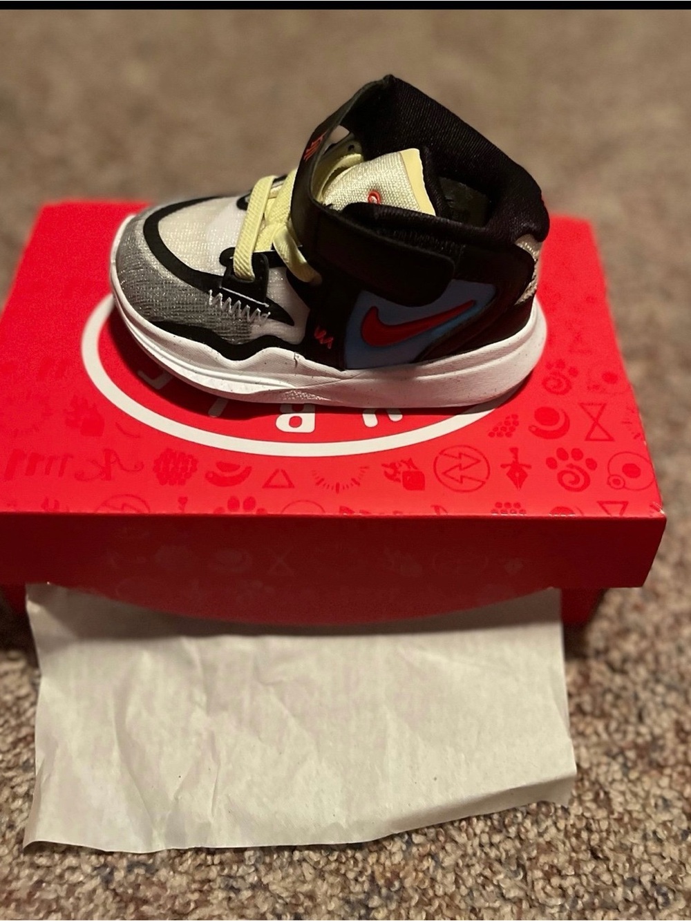 Nike Kids High-Top Sneaker in Black, White, Red, Blue, Yellow